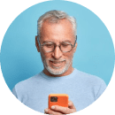 an old uncle is using phone